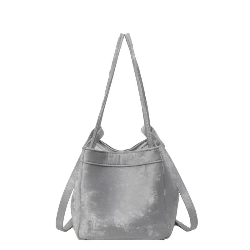 Light Luxury PU Magnetic Buckle Bucket Bag – 2025 Trendy Women's Fashionable Shoulder Bag.