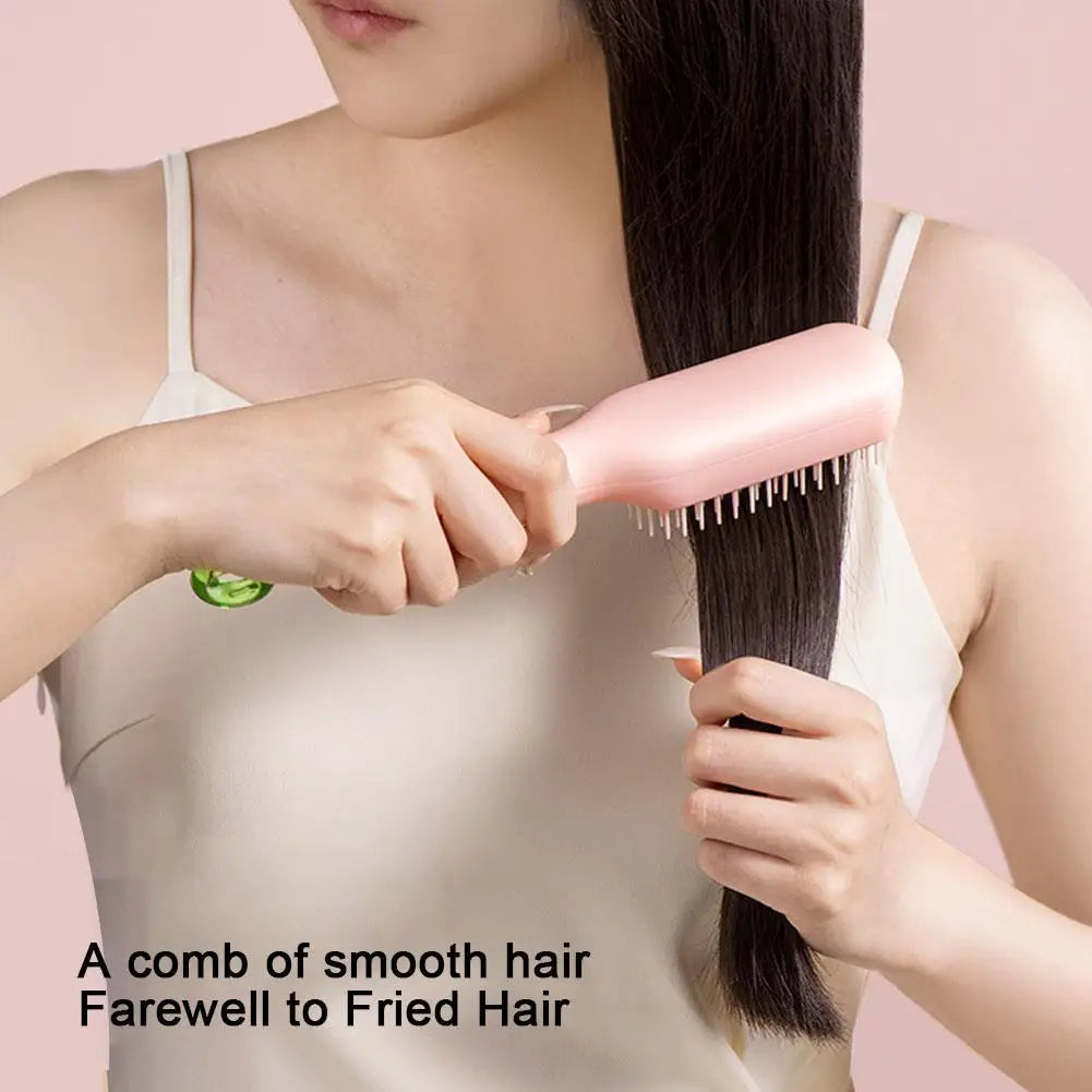 Self-Cleaning Anti-Static Massage Comb – Retractable Brush for Smooth Hair and Scalp Care.